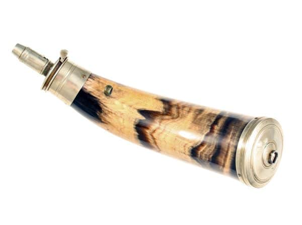 A Polished Horn Flask.