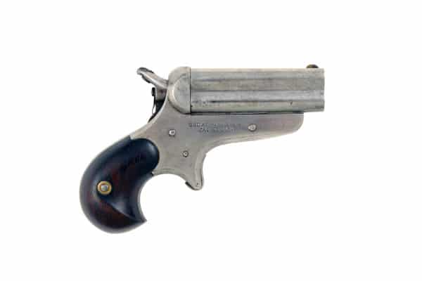 A Sharps Model 4 Barrel Derringer.