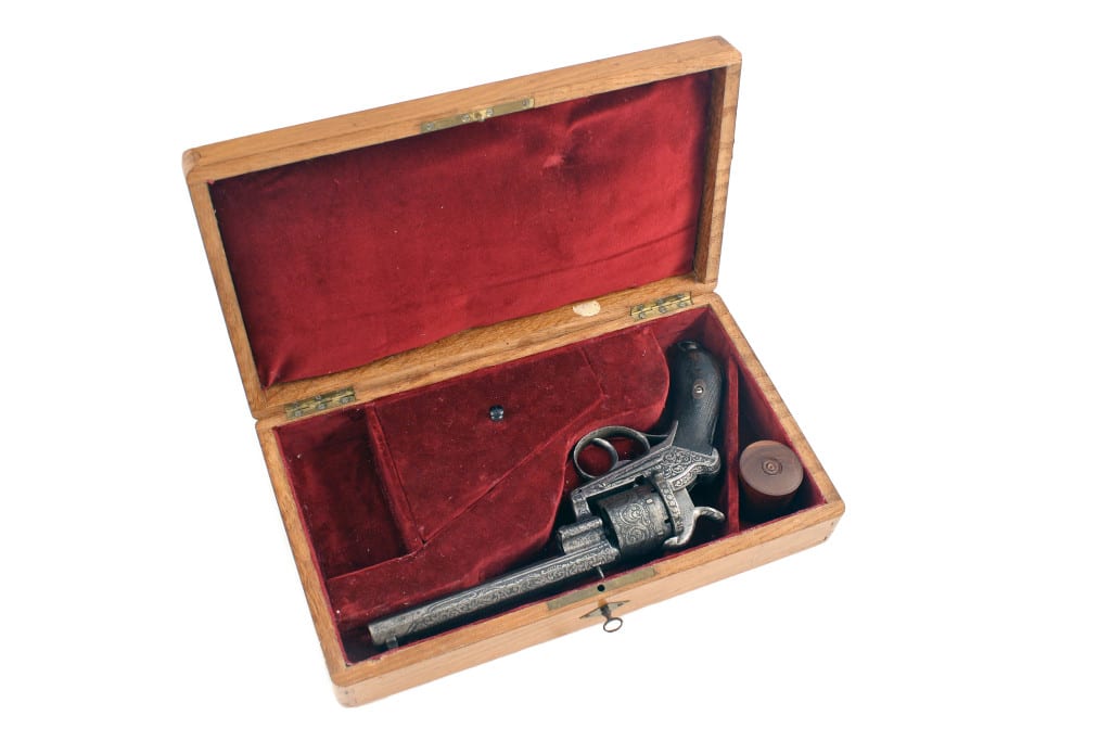 A Cased Pin Fire Revolver