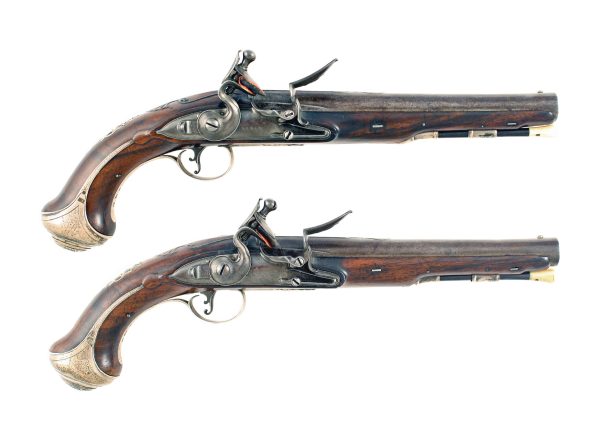 A Sleepy Pair of Silver Mounted Holster Pistols by Barbar of London.