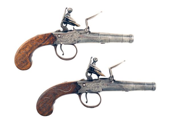 A Pair of Silver Inlaid Pistols